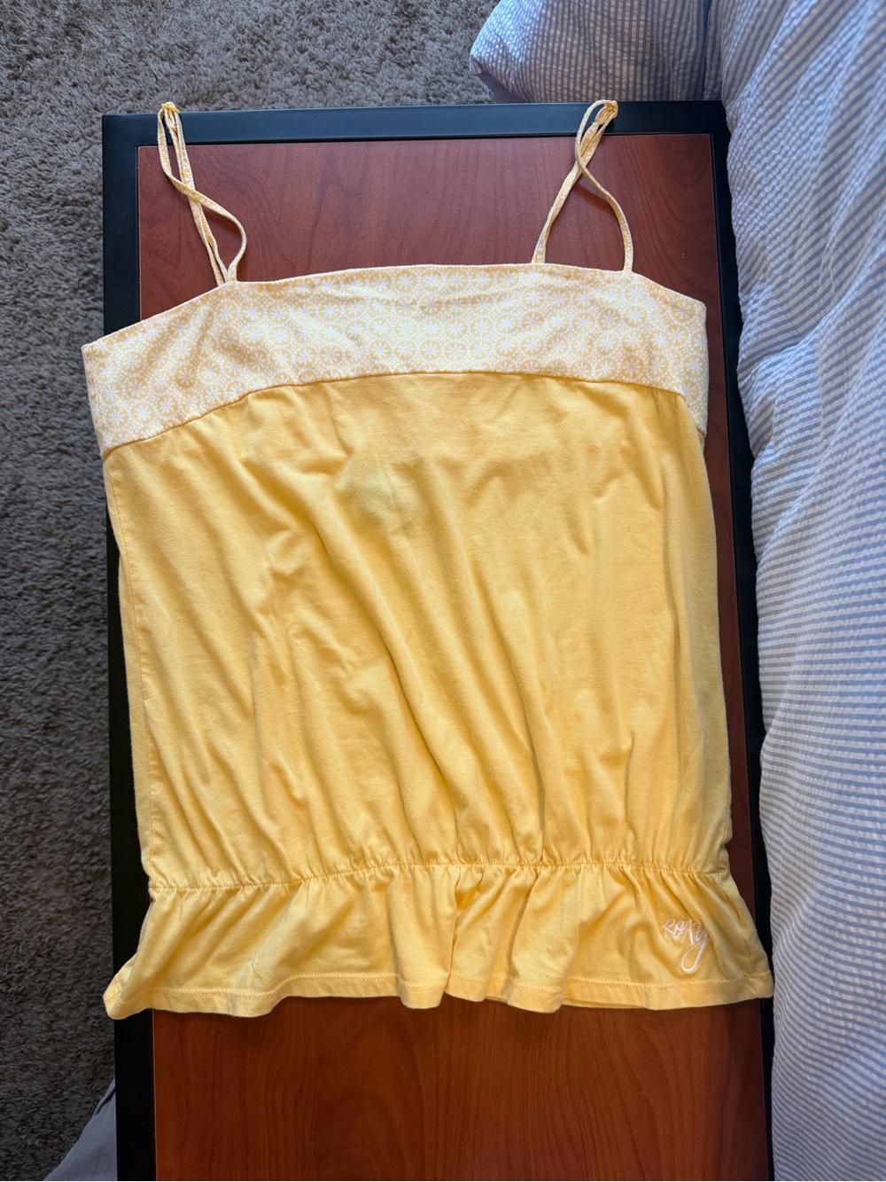 Women’s yellow ruffle tank top